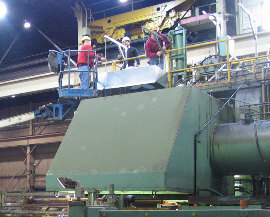 ACS crews during the installation of an air filtration system we designed and provided all of the materials needed for installation materials for commercial air cleaning systems design
