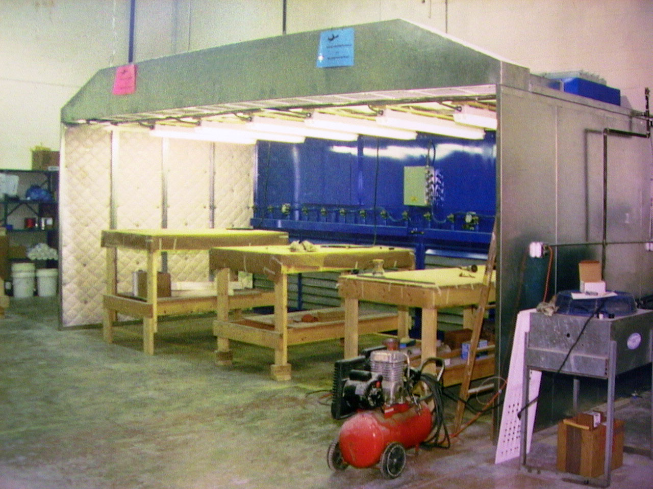 Multi station fabrication is possible in a large environment booth with industrial air cleaning equipment and filtration system Industrial environmental dust and fume collection booths for safe air in factories